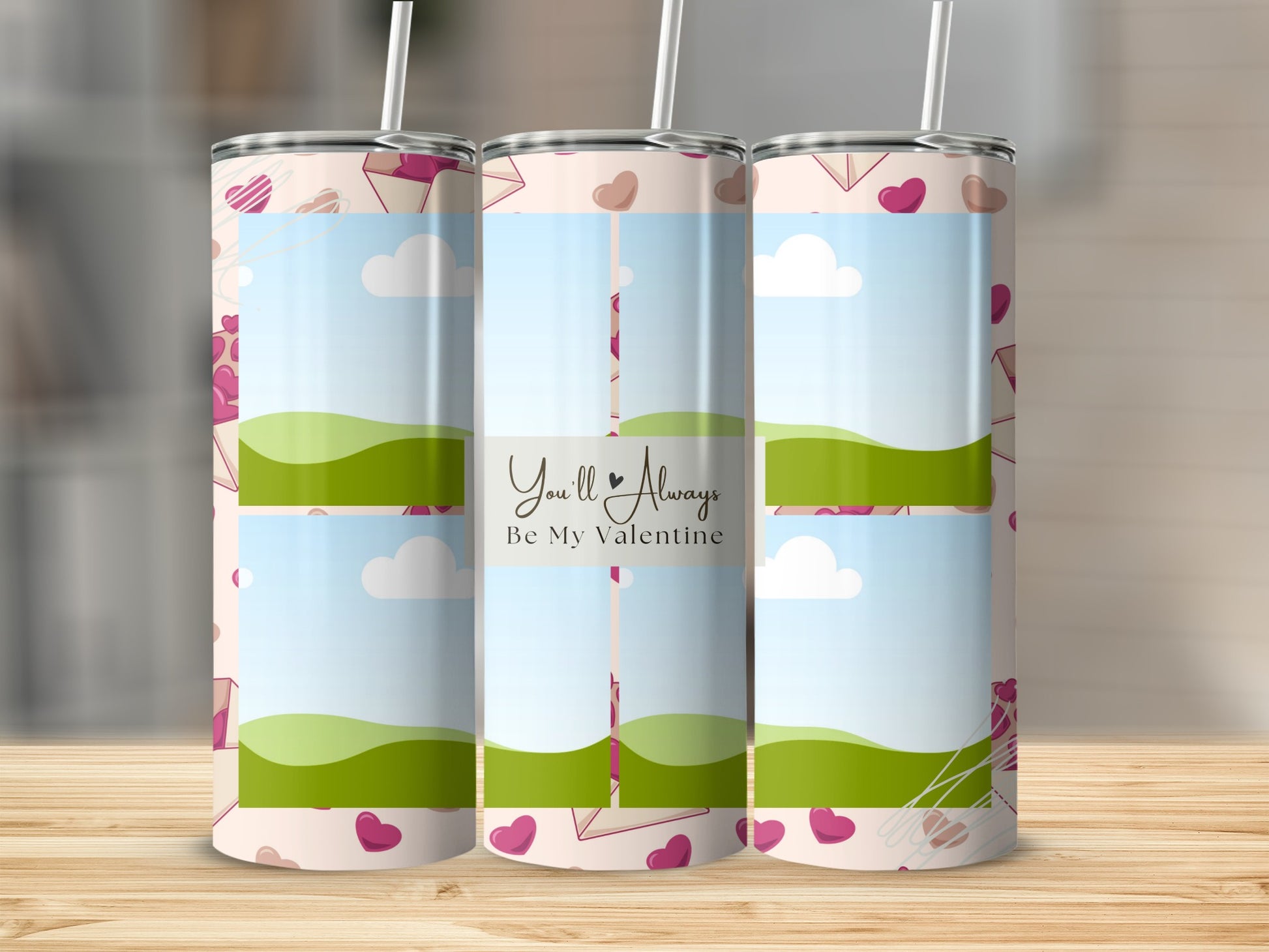 Three tumblers with a Valentine's Day design featuring hearts and envelopes.