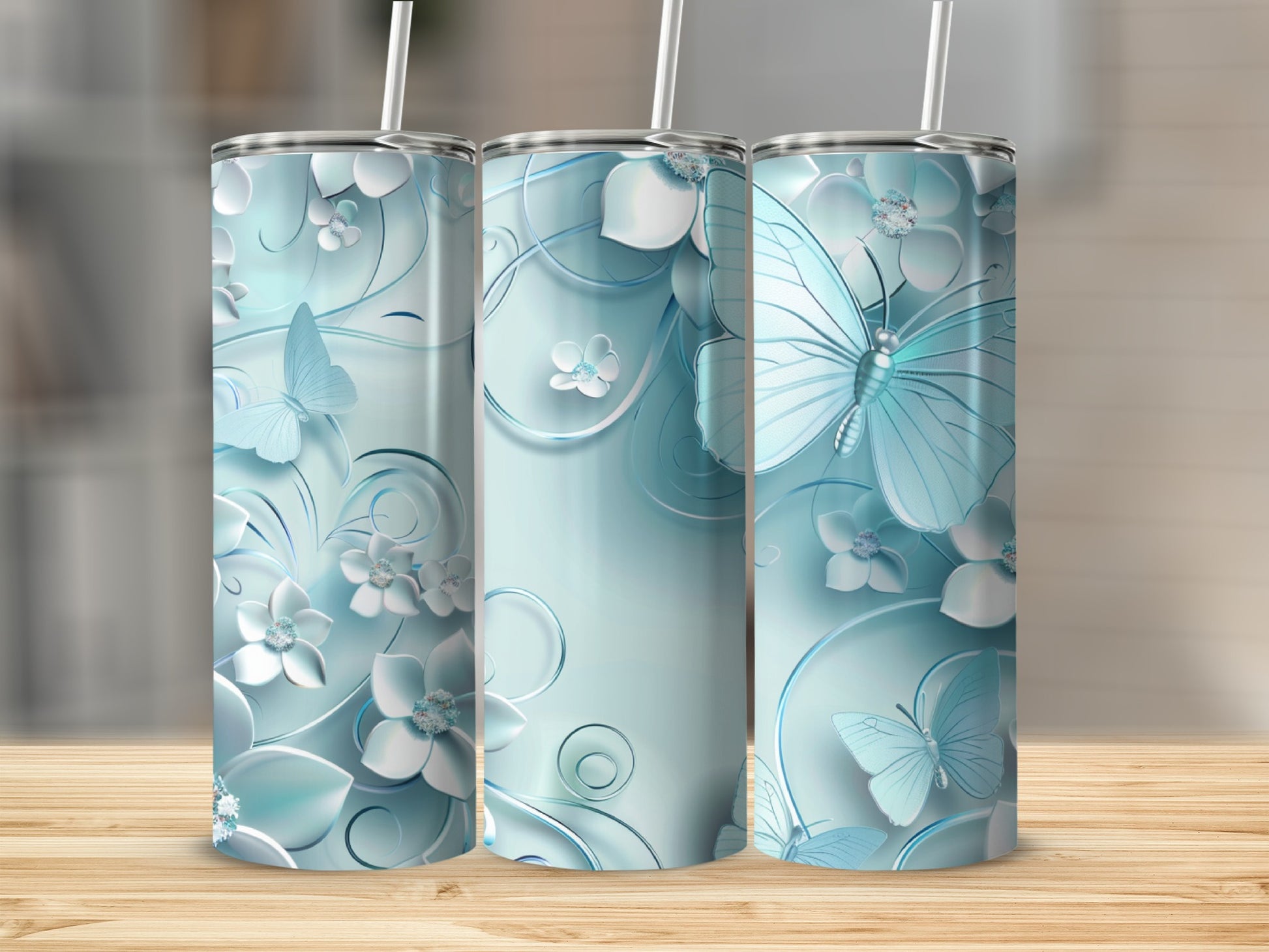 Light blue floral and butterfly pattern on a skinny tumbler.