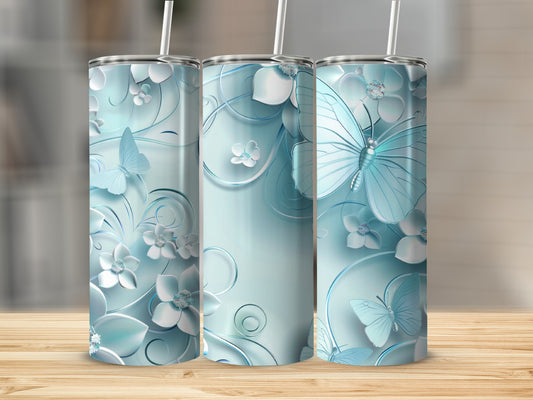 Light blue floral and butterfly pattern on a skinny tumbler.