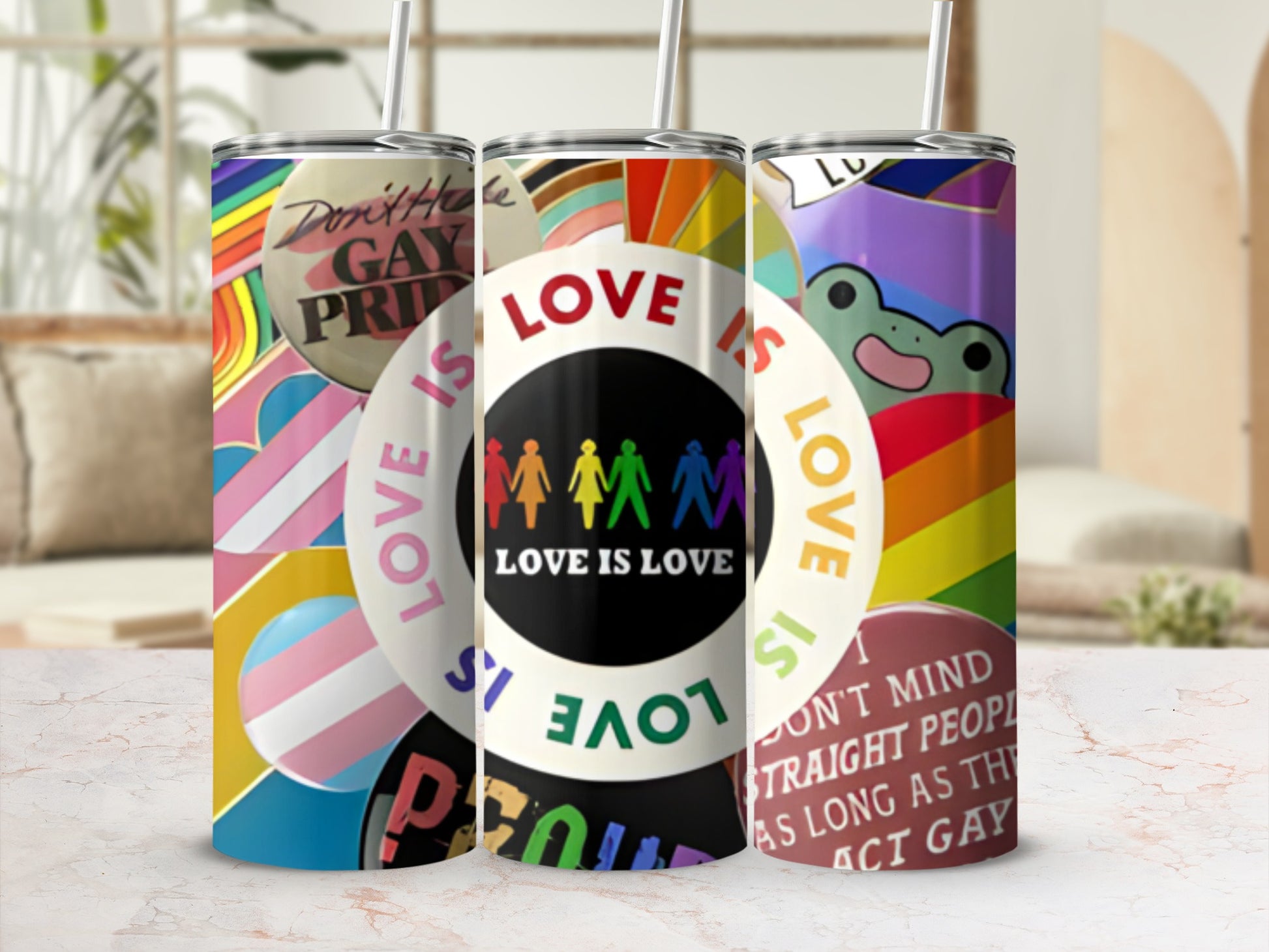 Pride themed tumblers with "Love is Love" and LGBTQ+ symbols.