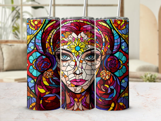 Three tumblers with colorful mosaic-style portraits of a woman's face.