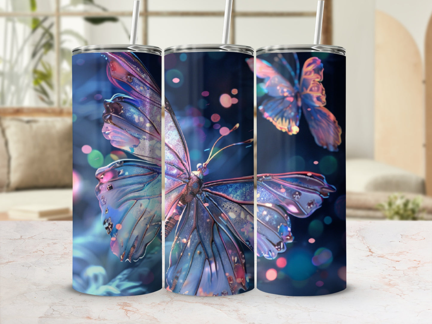 Three tumblers featuring iridescent butterfly designs against a blurred, bokeh background.