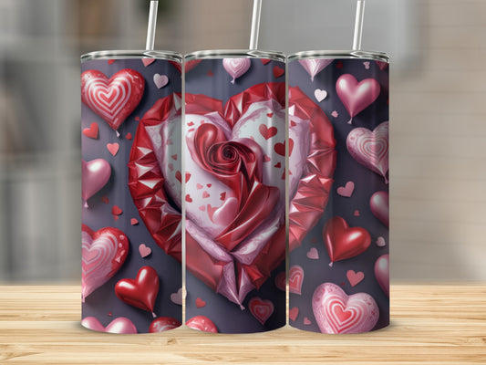 Three tumblers adorned with heart patterns, including a large rose-shaped heart.