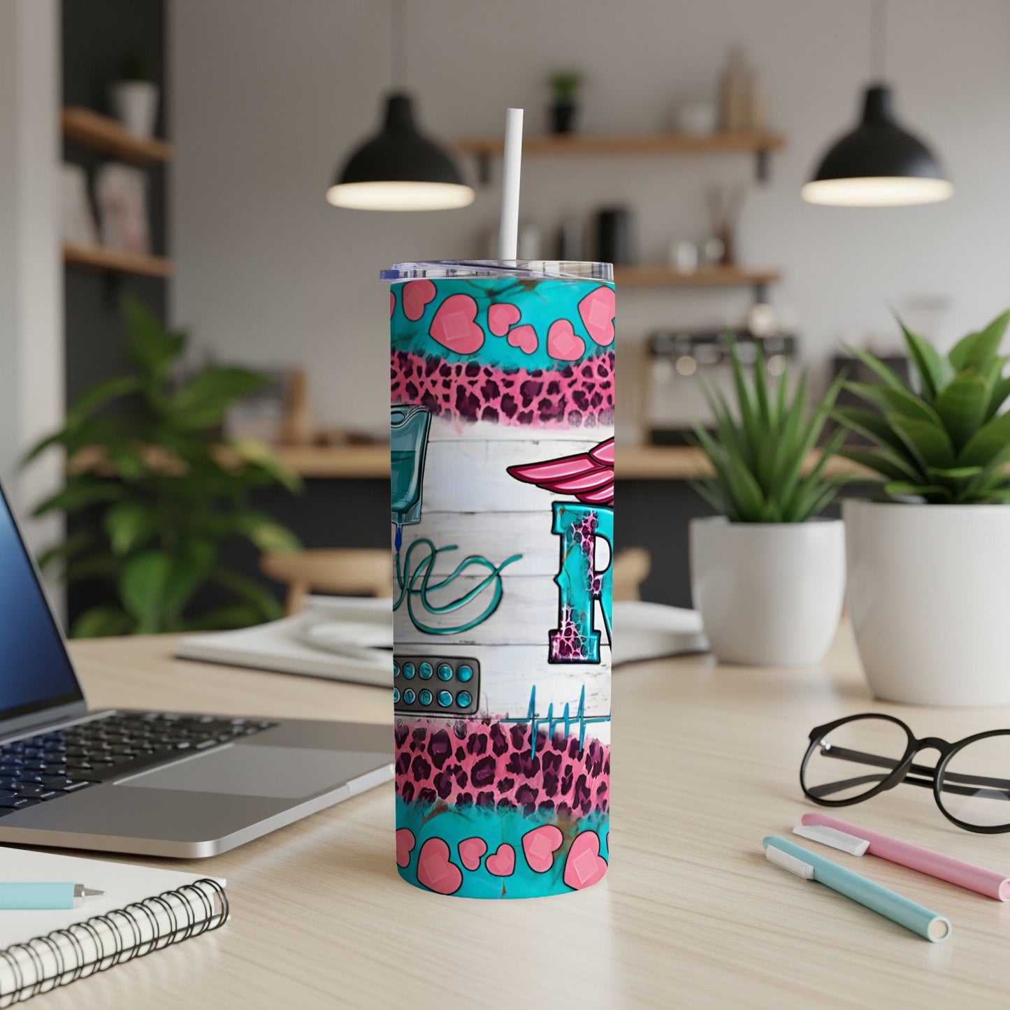 Pink and blue leopard print tumbler with medical icons and text.