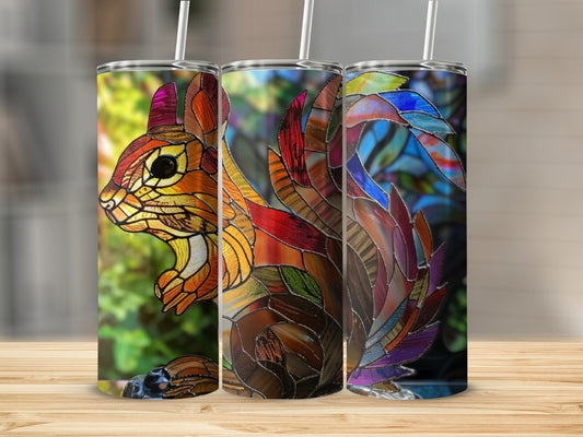 Stained glass squirrel design on a tumbler.