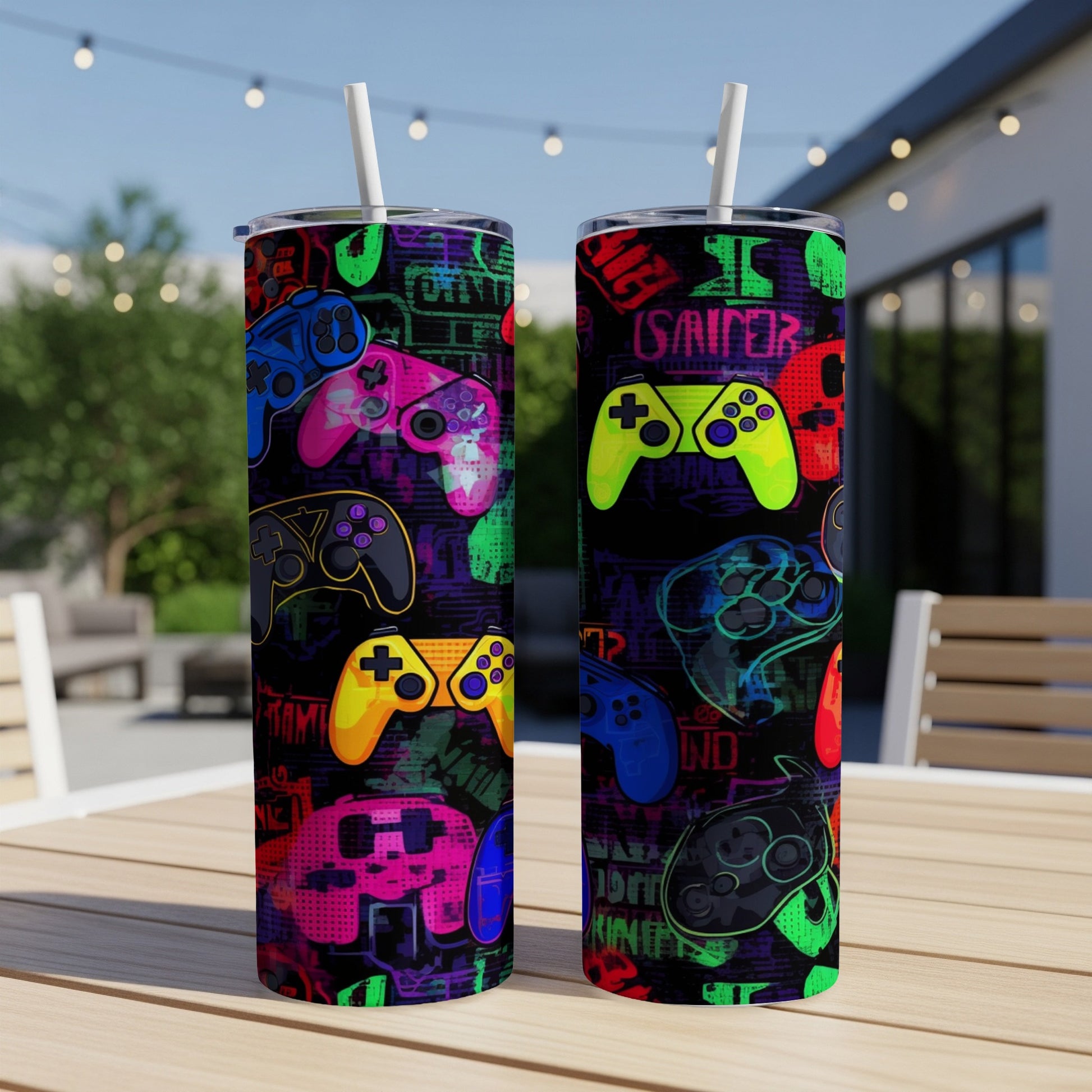 Two tumblers with a repeating pattern of colorful video game controllers.