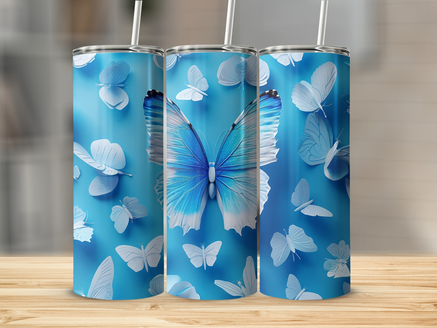 Blue tumbler with white and blue butterflies.