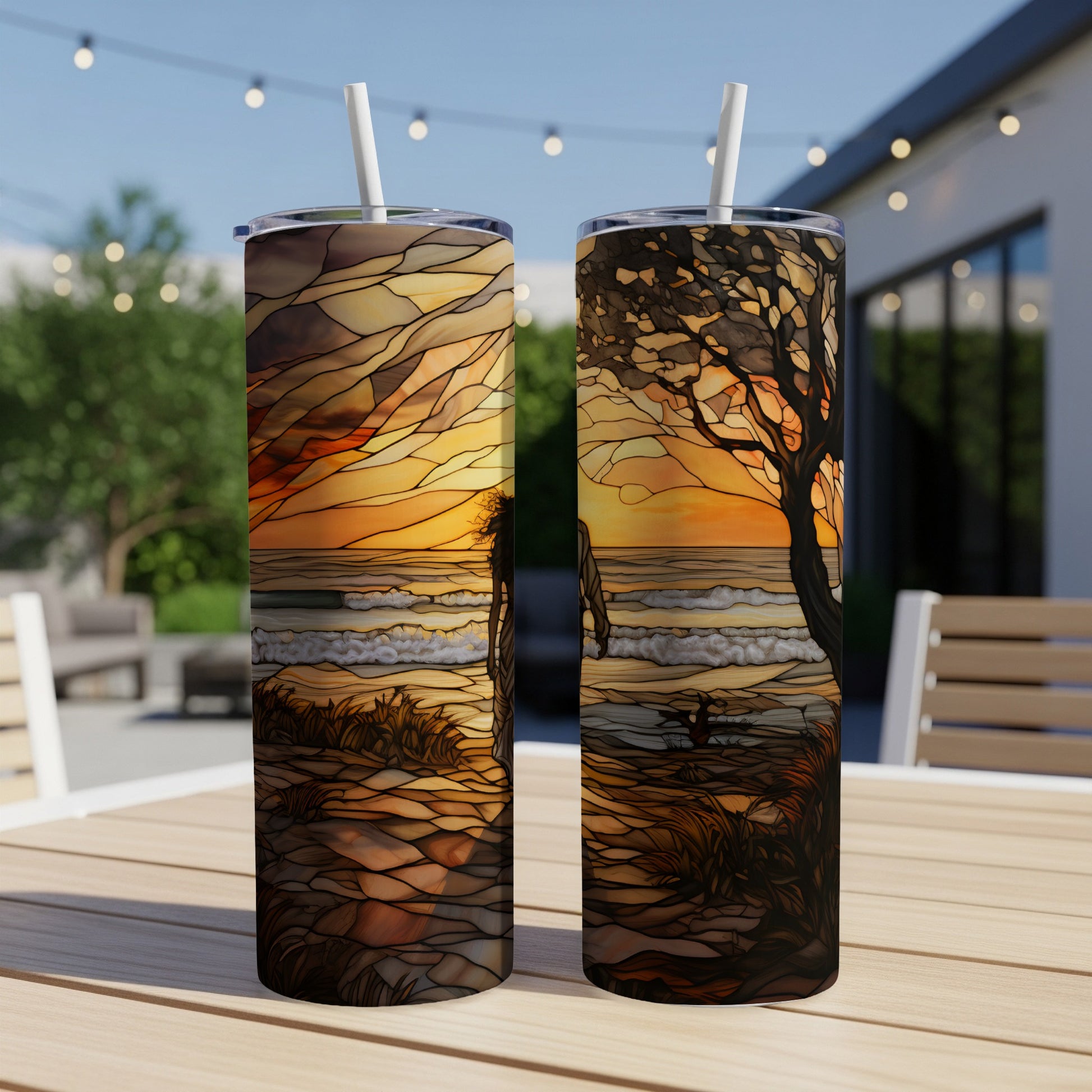 Two tumblers showing stained glass sunset beach scene with person walking.