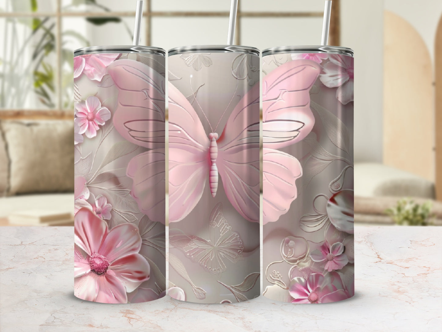 Pink butterfly and floral design on a tumbler.
