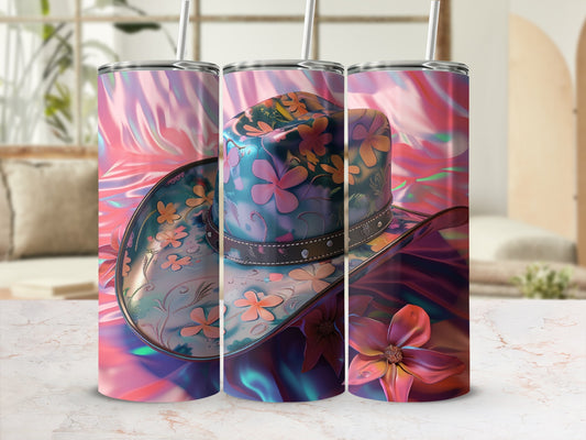 Cowboy hat with floral pattern on colorful, abstract background.