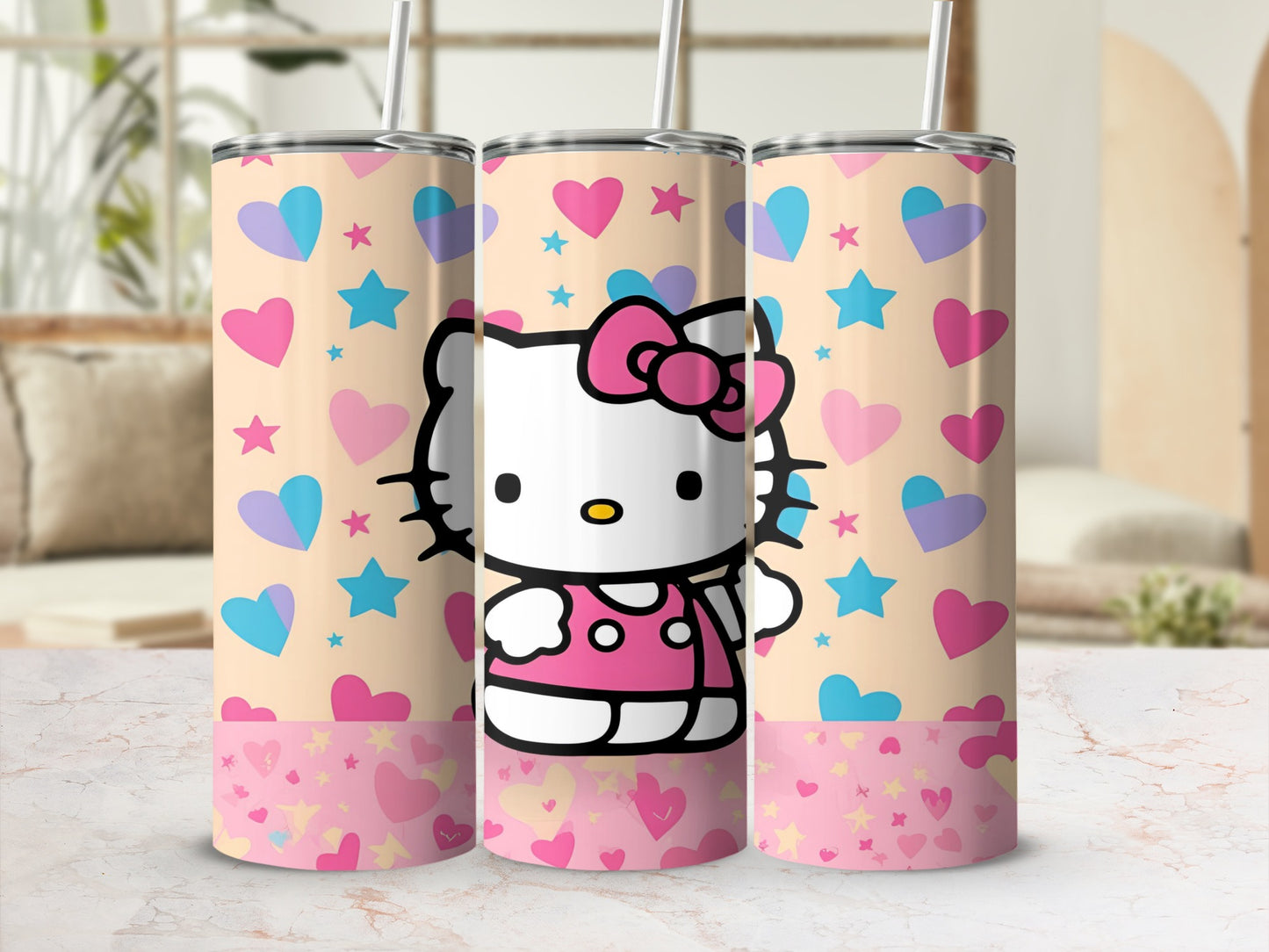 Hello Kitty tumbler with pink and blue hearts and stars on beige background.