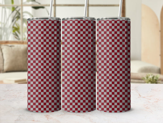Three stainless steel tumblers with a red and white checkered pattern.
