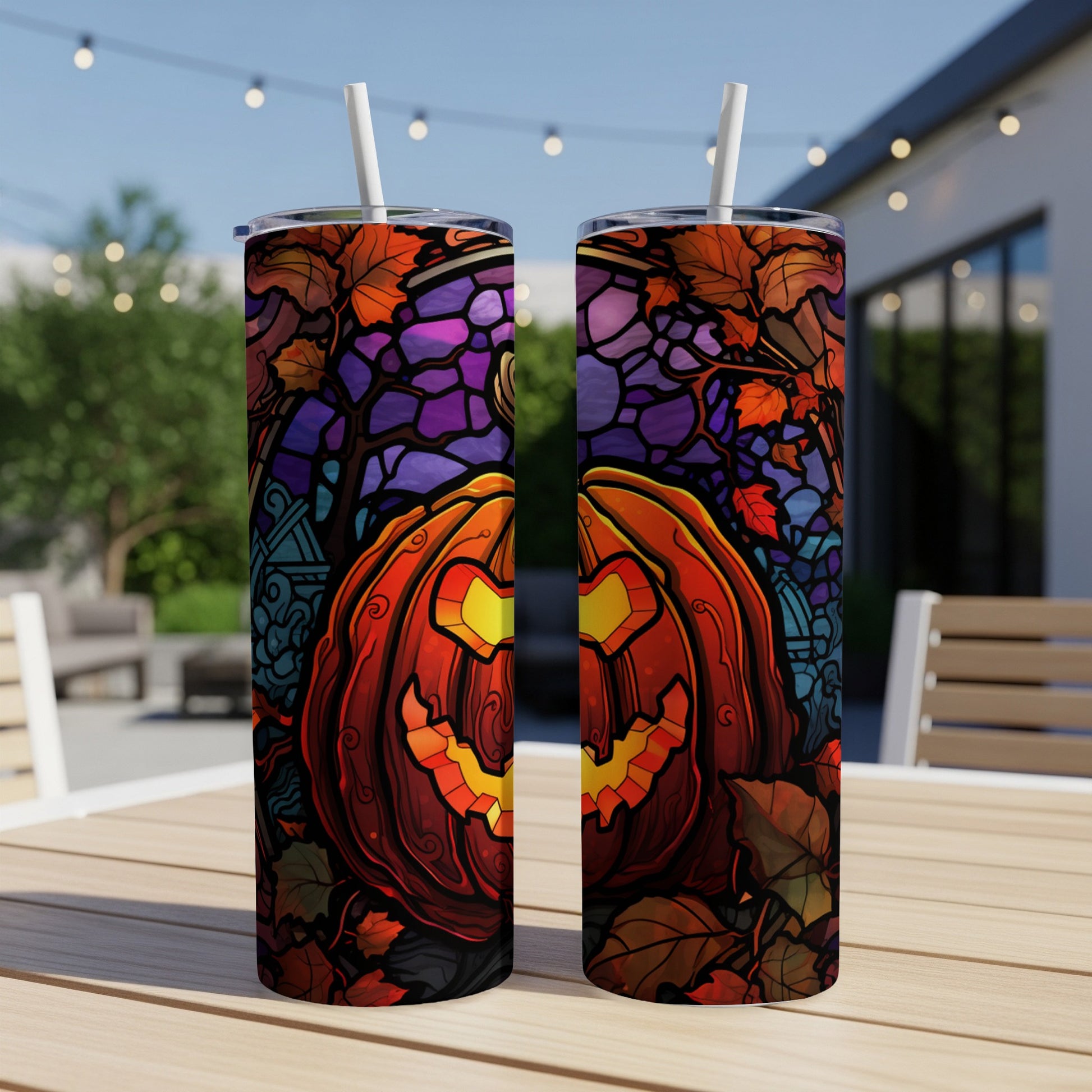 Two tumblers with a stained-glass Halloween pumpkin design.