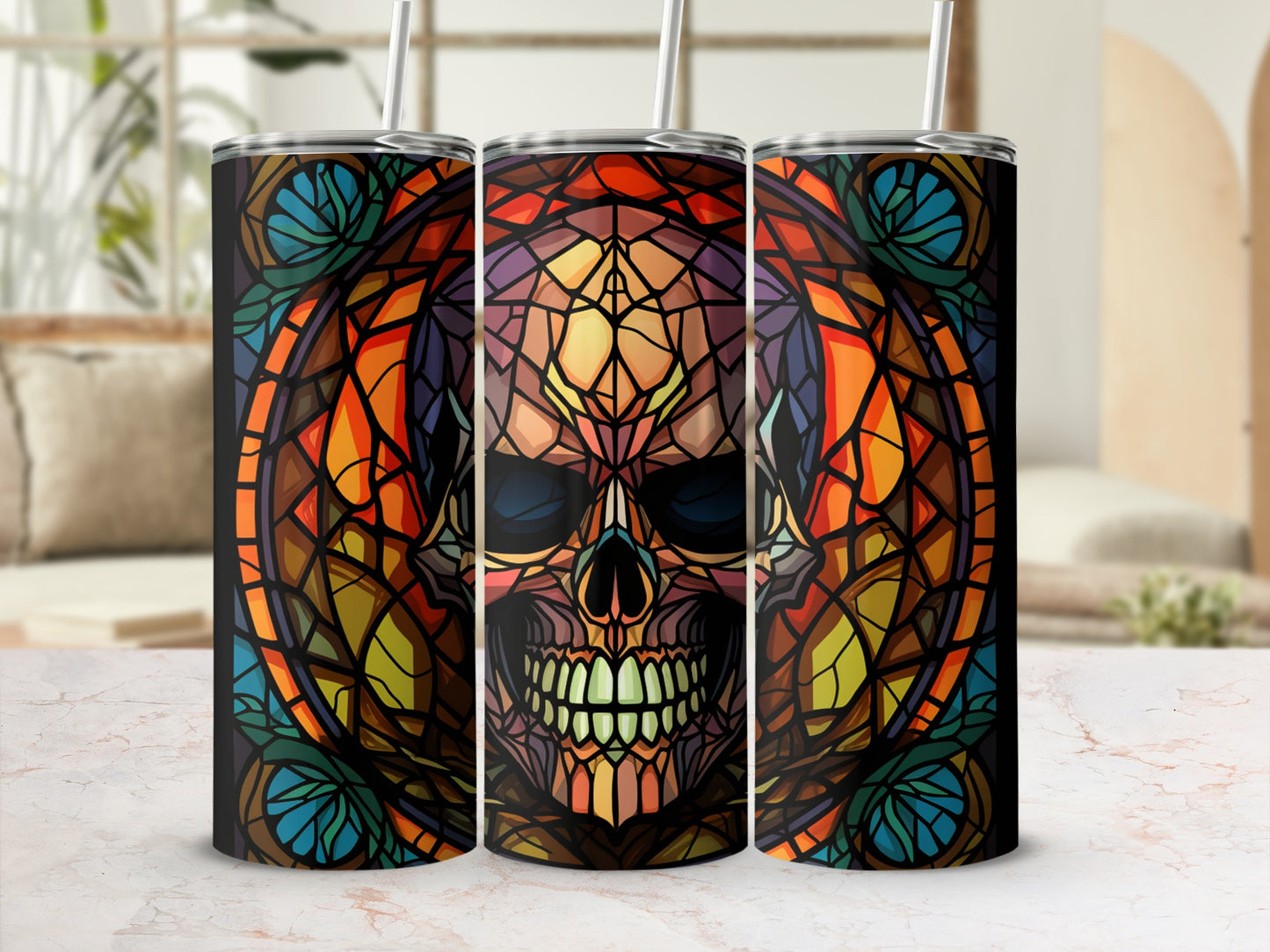Triptych of tumblers featuring a stained-glass skull design.