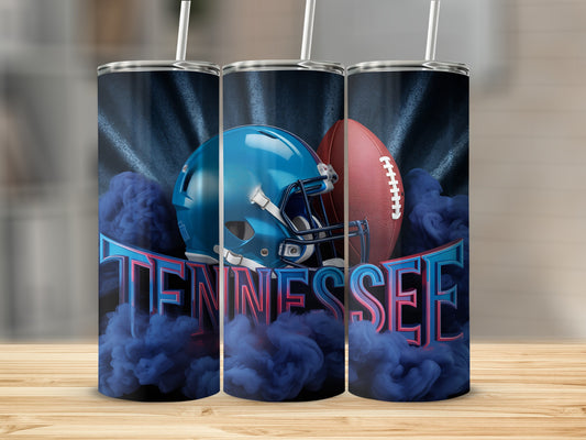 Tennessee football helmet and ball with blue smoke and lettering.