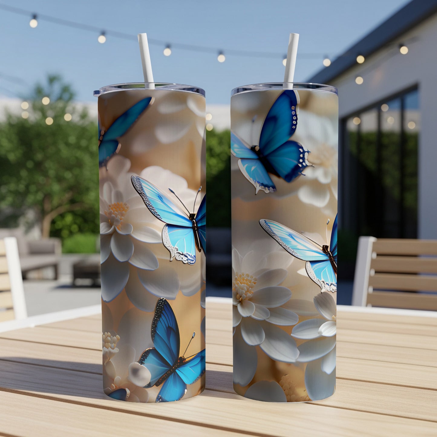 Two tumblers with blue butterflies and white flowers design.