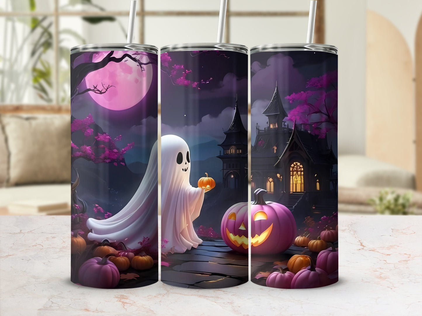 Three tumblers with a spooky Halloween scene featuring a ghost, pumpkins, and a haunted house.
