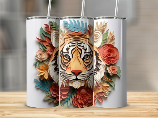 Tiger face illustration surrounded by colorful paper flowers on a white tumbler.
