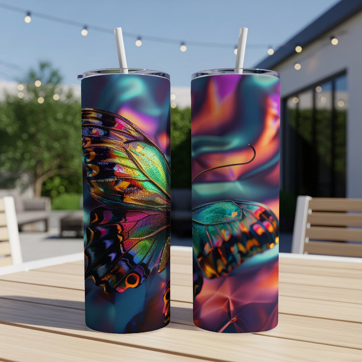 Two iridescent butterfly wing tumblers on a wooden table.