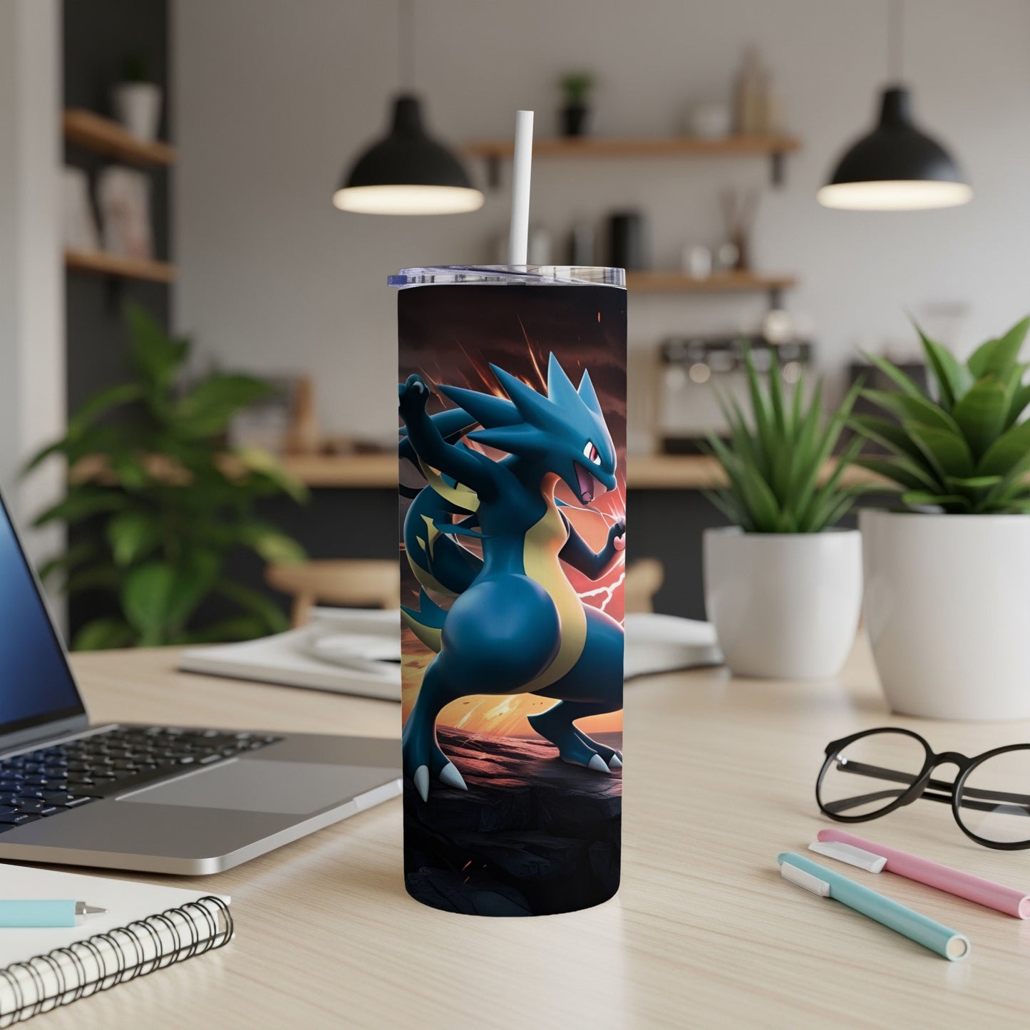 Blue dragon-like creature with yellow accents on a tumbler cup.
