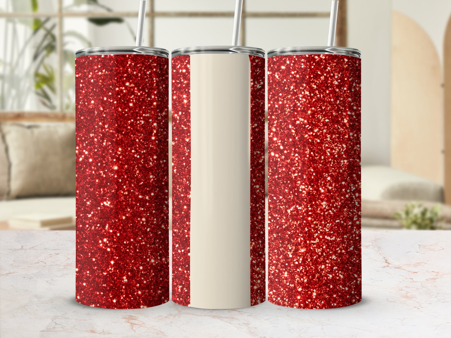 Three glittery red tumblers with cream-colored sections.