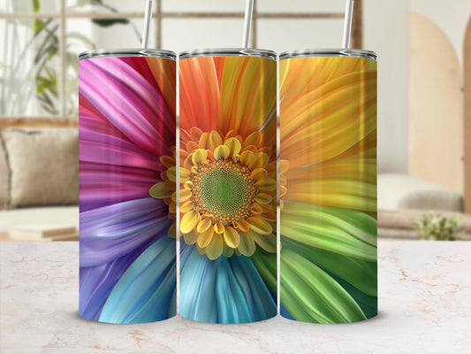 Three tumblers decorated with vibrant, colorful flower petals.