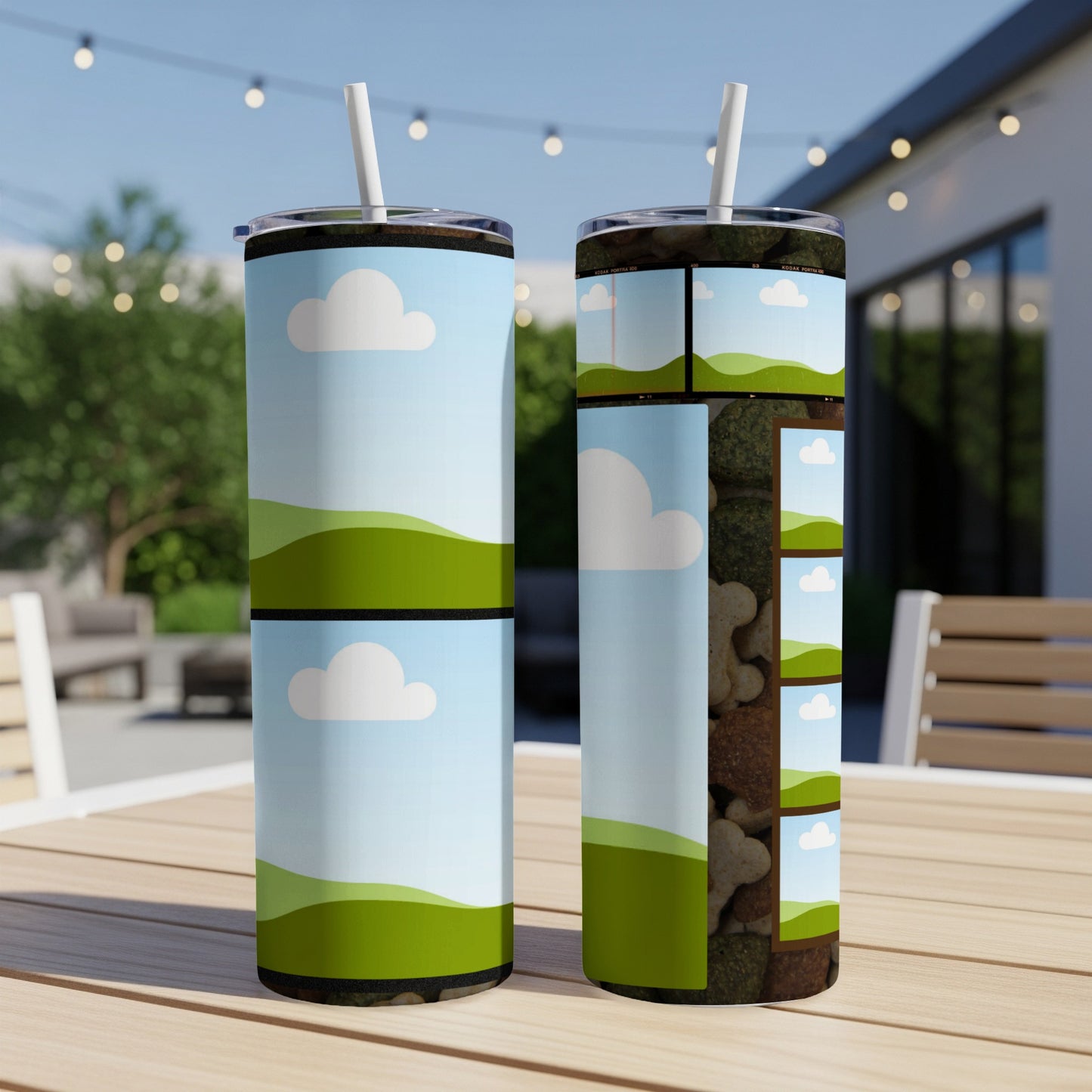 Two tumblers with a blue sky, clouds, and green hills design.