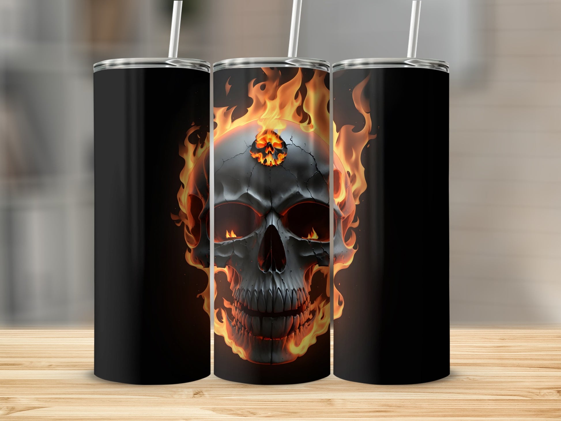 Black tumbler with flaming skull graphic on wooden surface.
