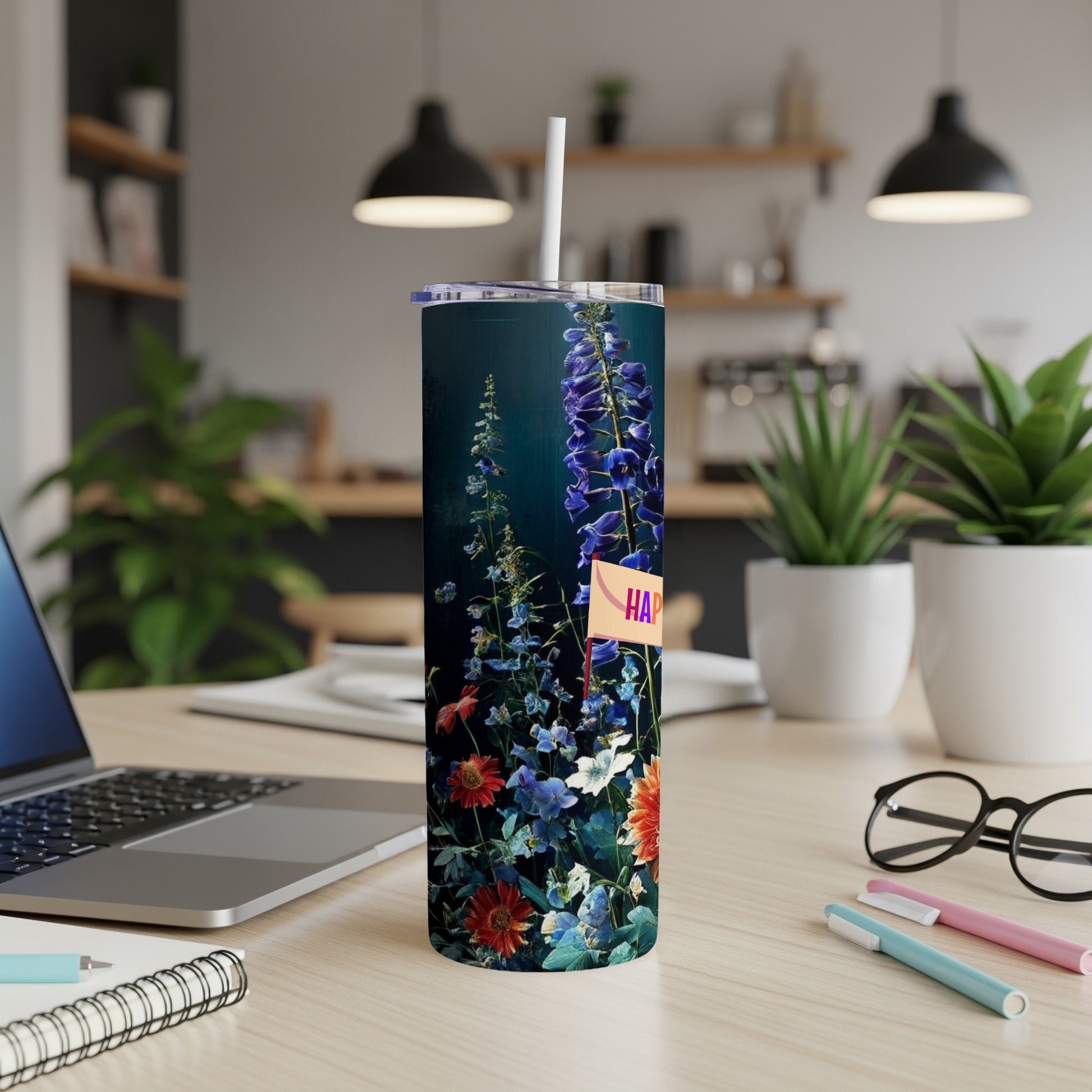 Dark tumbler with colorful floral pattern and "Happy" flag.