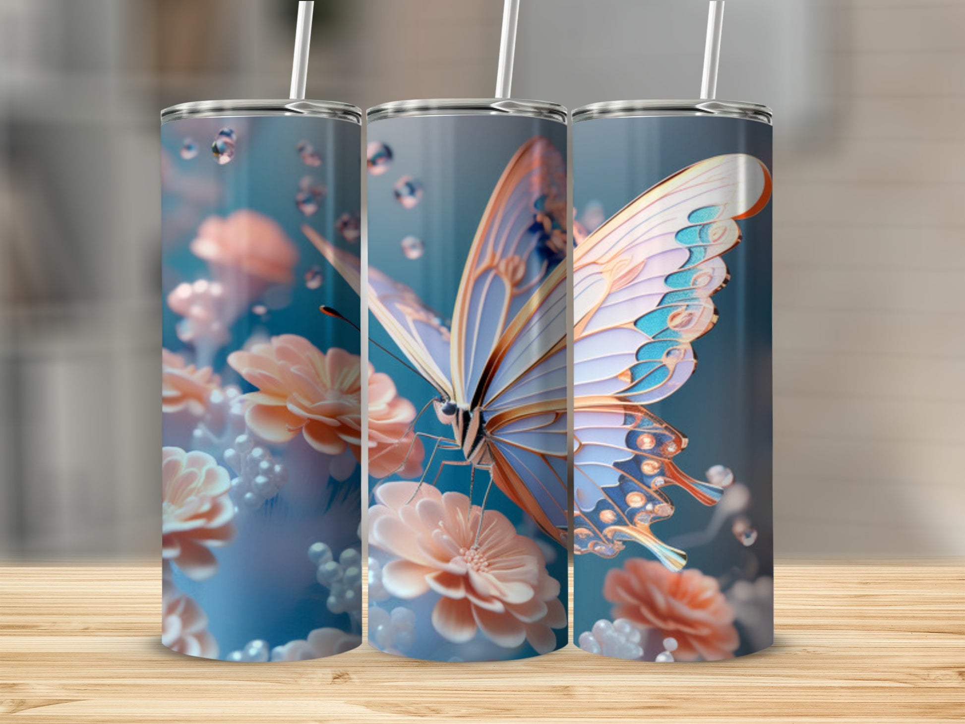 Butterfly and floral design on three tumblers.