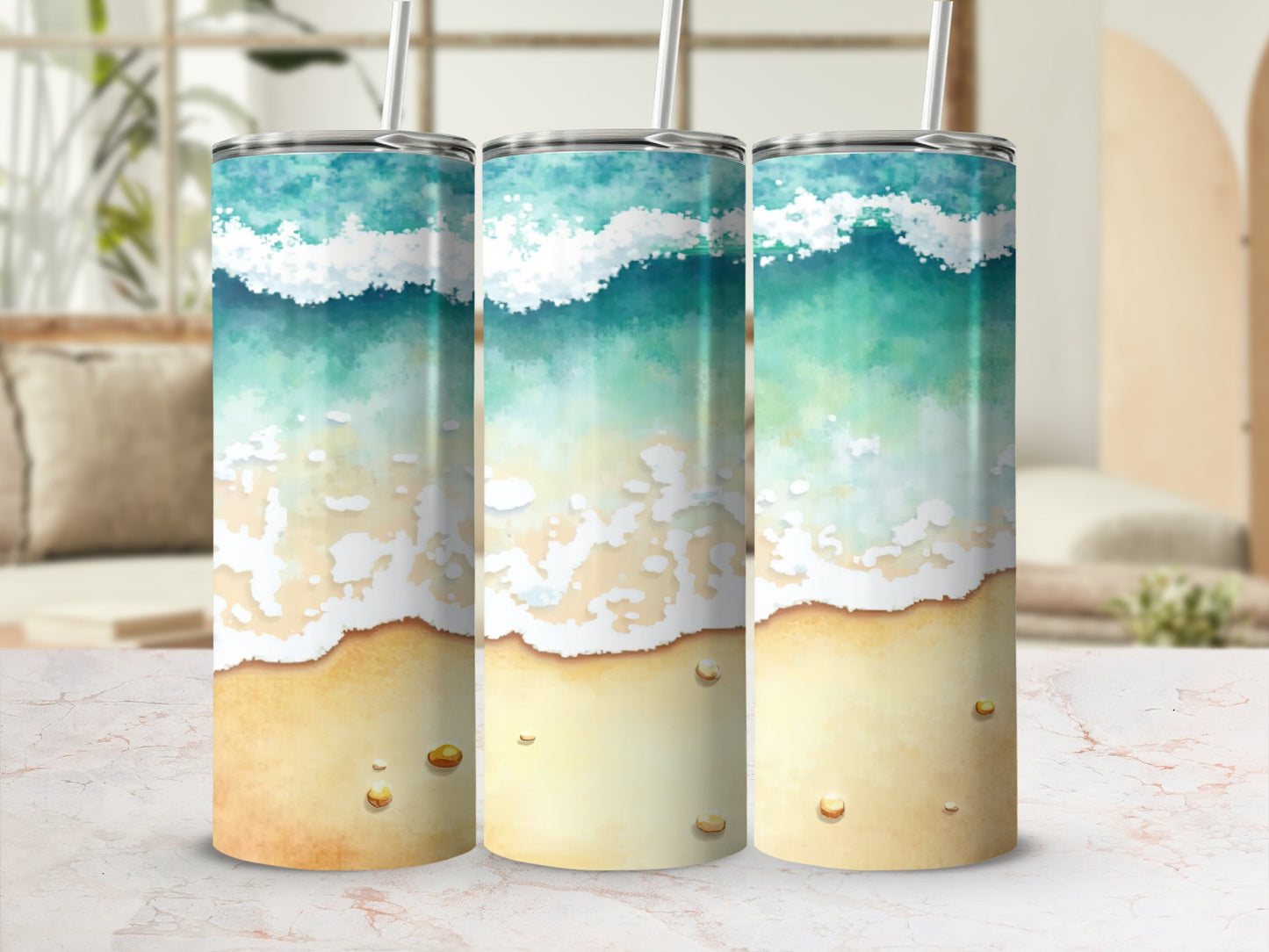 Three tumblers with ocean waves crashing on a sandy beach.