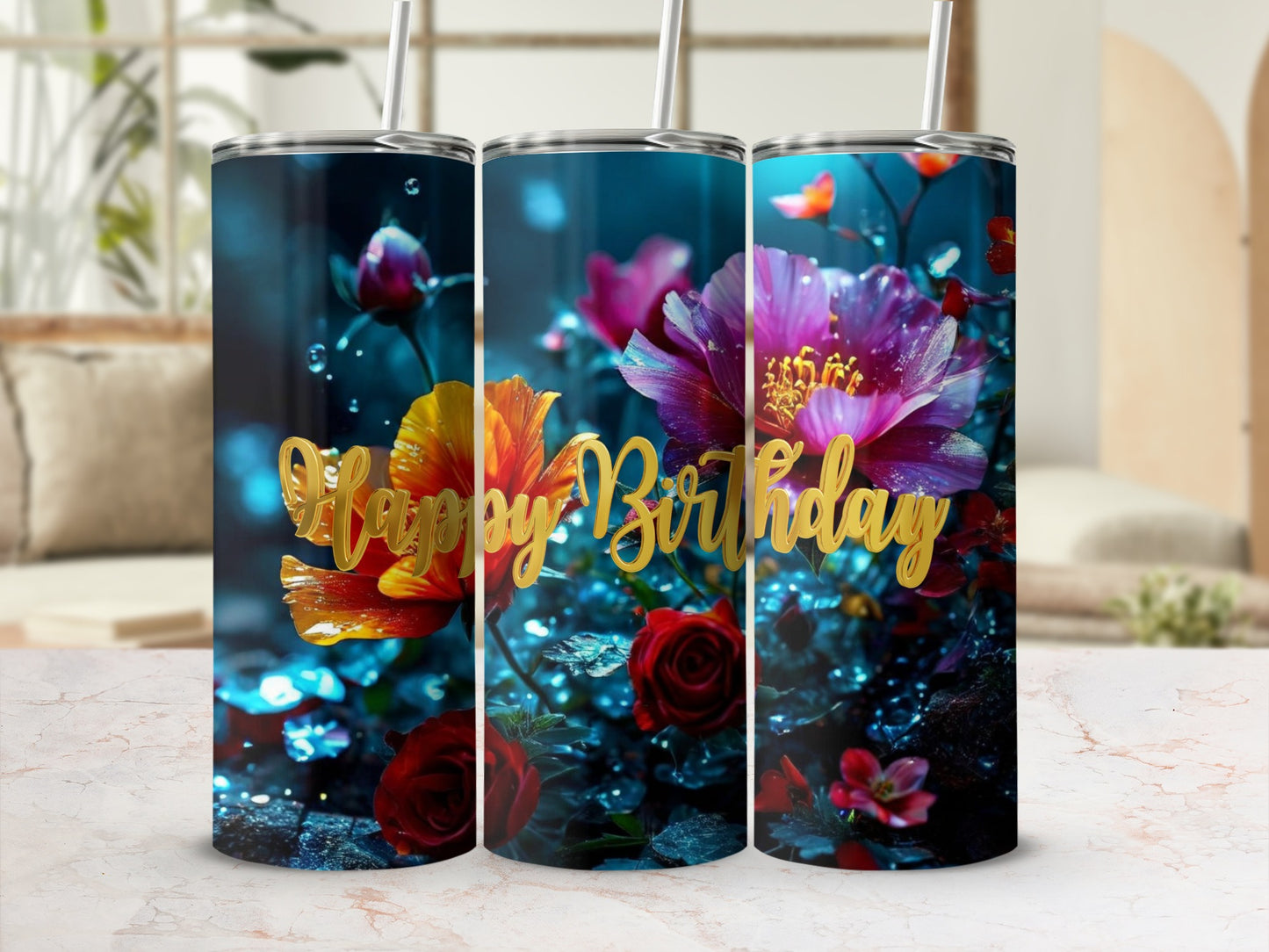Three tumblers with a glowing "Happy Birthday" script and floral design.
