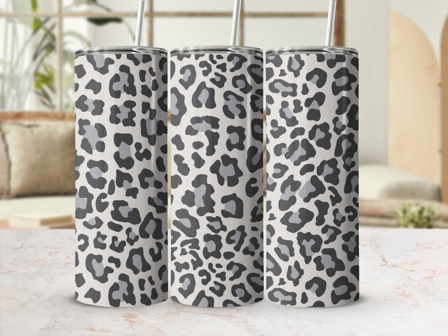 Three tumblers with a grey and black leopard print pattern.