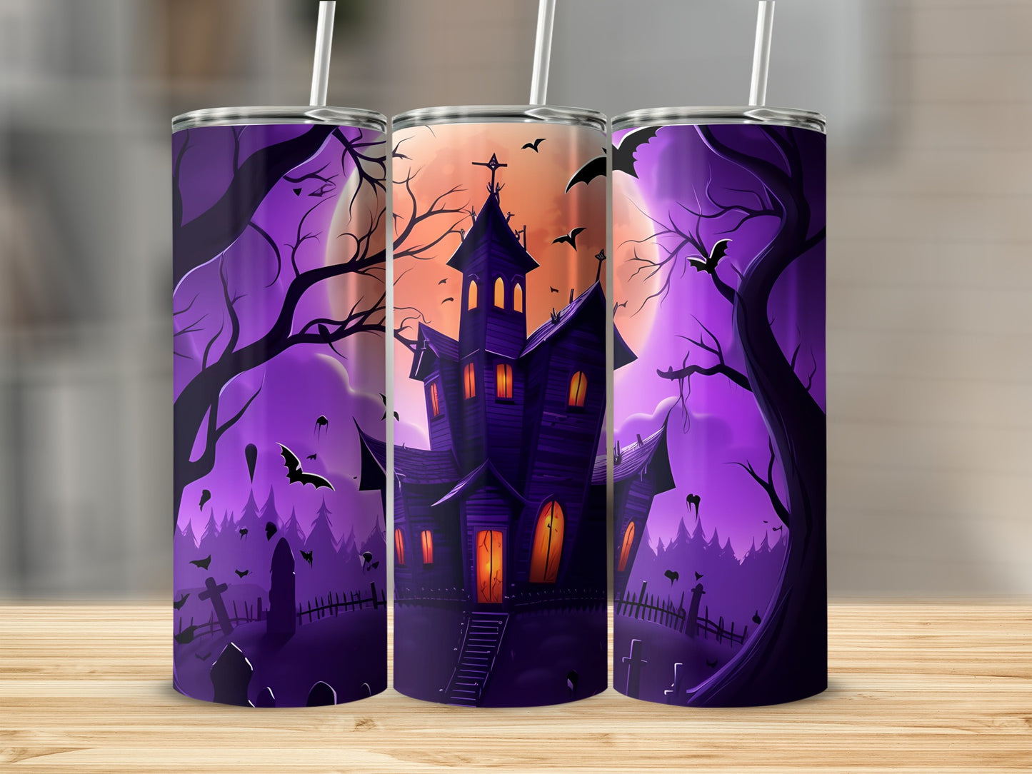 Three tumblers with a purple Halloween haunted house, bats, and graveyard scene.