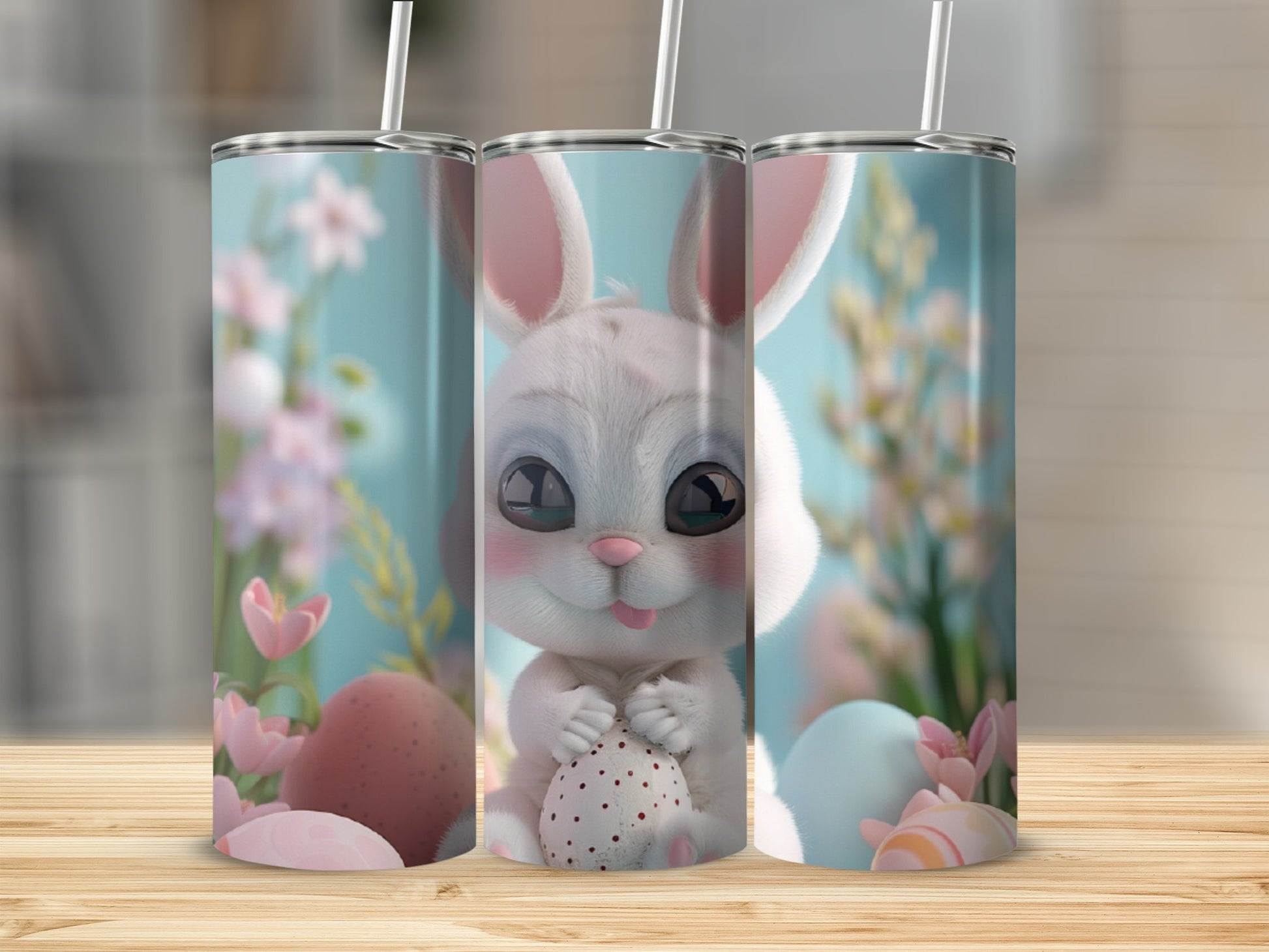 Three Easter bunny tumblers with pastel eggs and flowers.