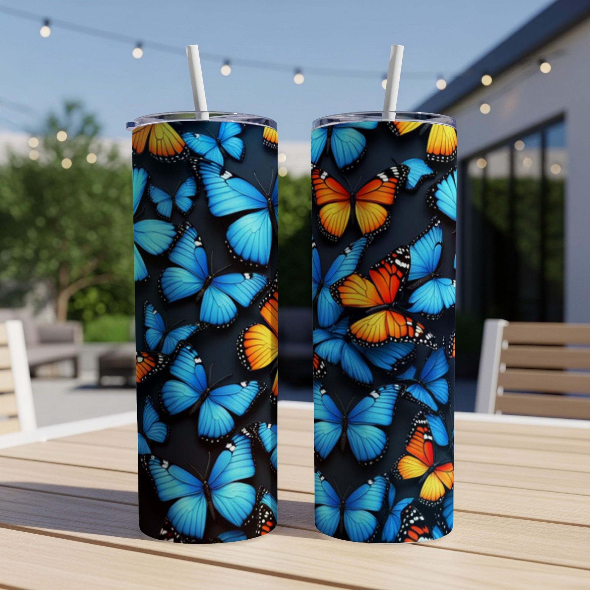 Two tumblers with blue and orange butterfly pattern.