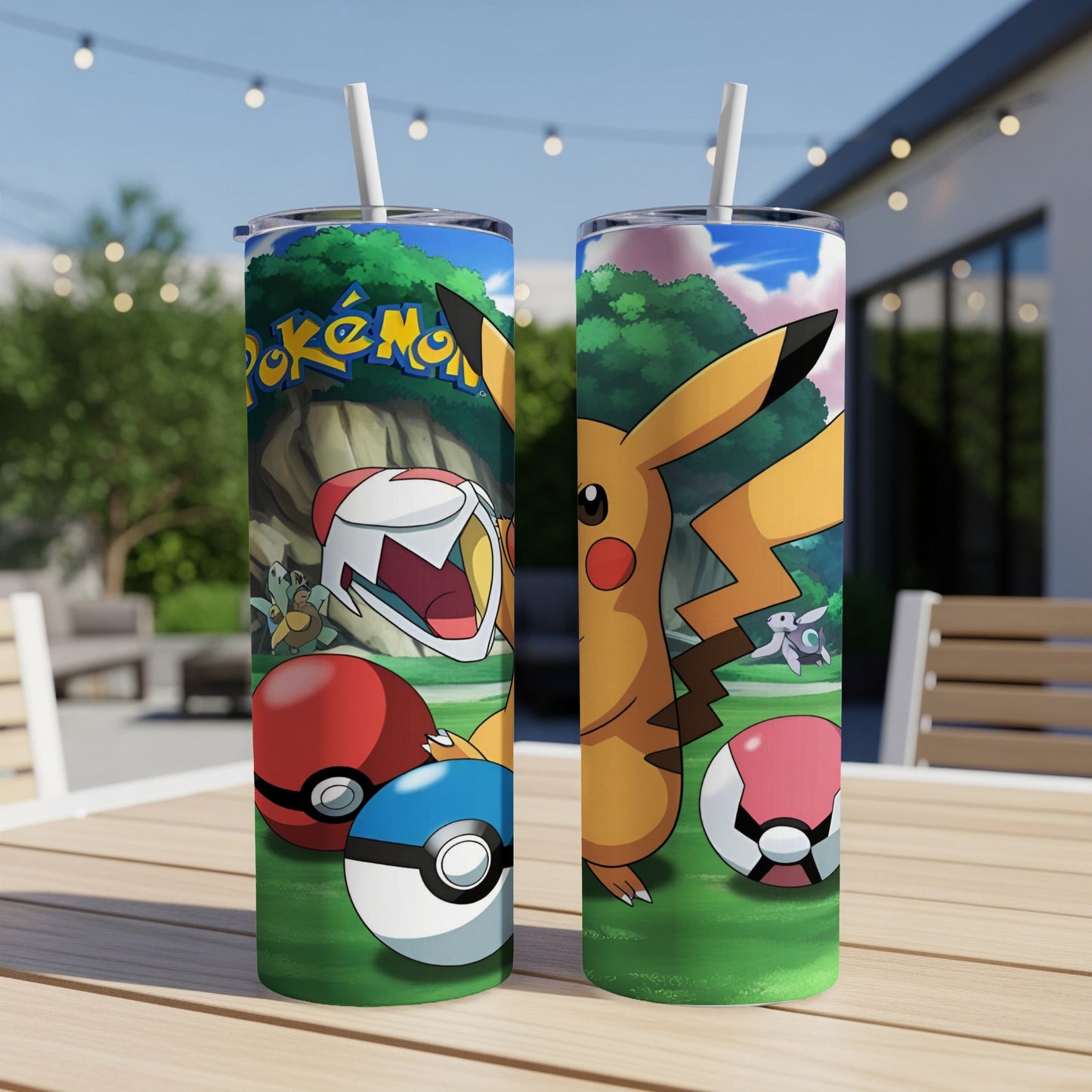 Pokémon tumbler with Pikachu, pokeballs, and trainers on a grassy background.