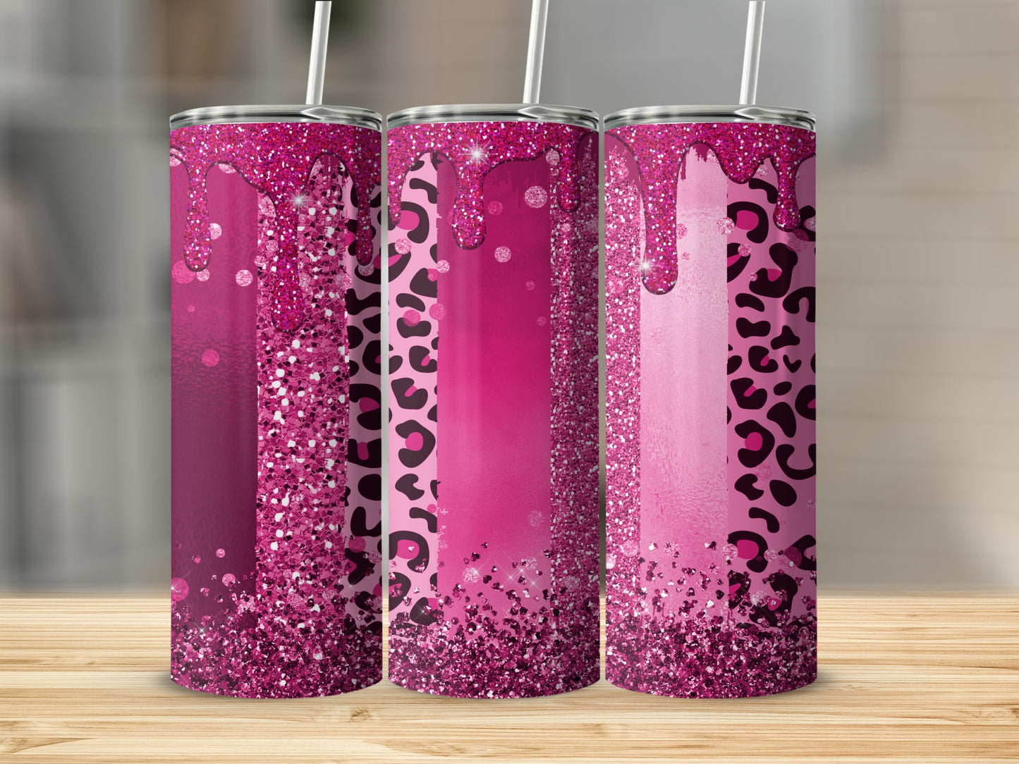 Three pink glitter tumblers with leopard print accents and dripping liquid design.