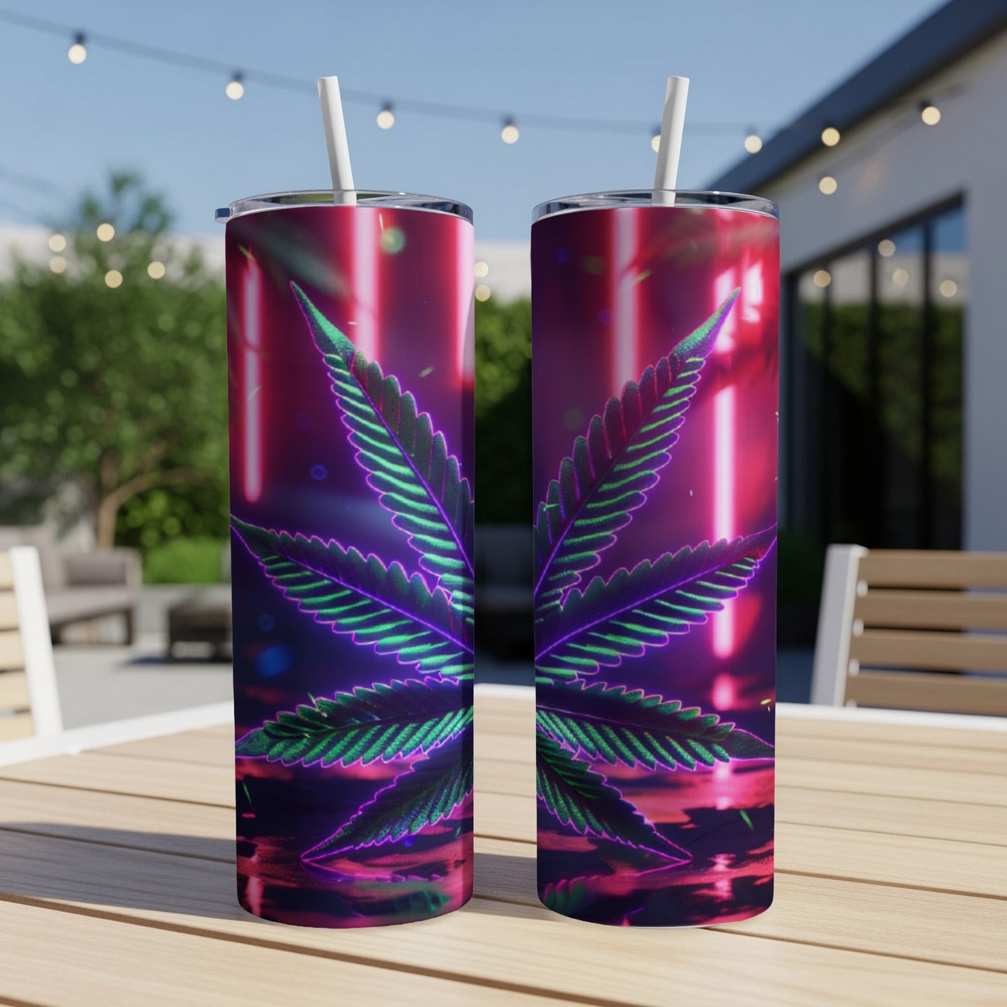 Two tumblers featuring a neon cannabis leaf design with a blurred outdoor background.