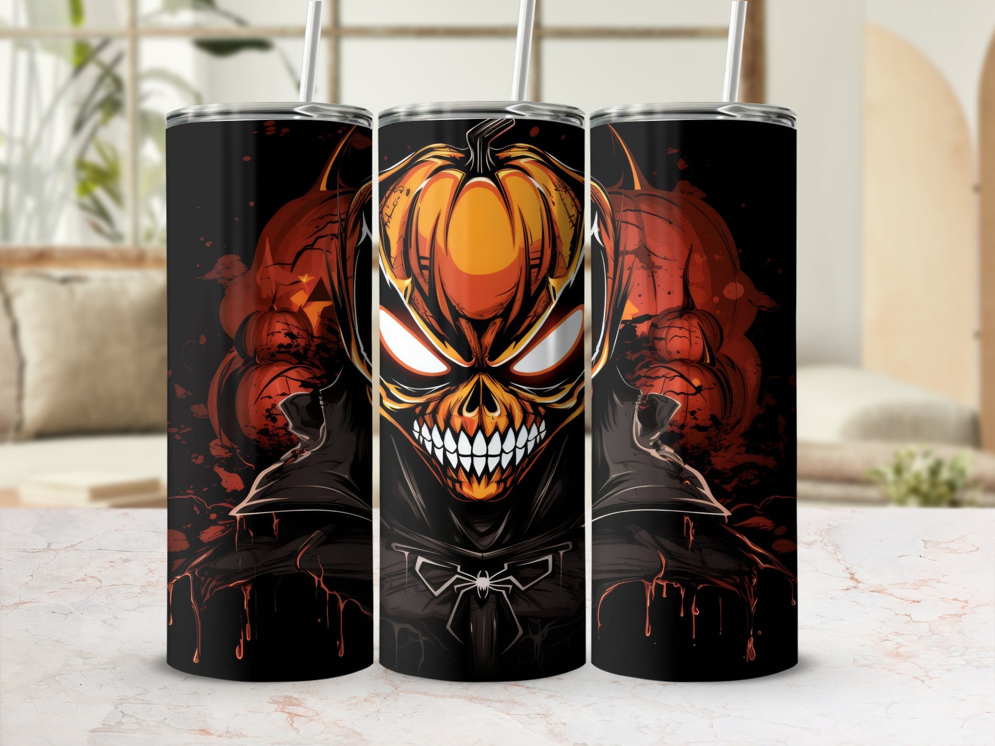 Three tumblers with a Halloween pumpkin skull design and spider bowtie.