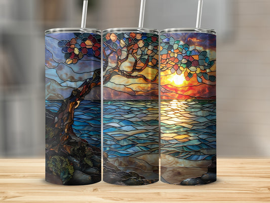 Three stained glass tumblers with nature scenes and sunset motifs.