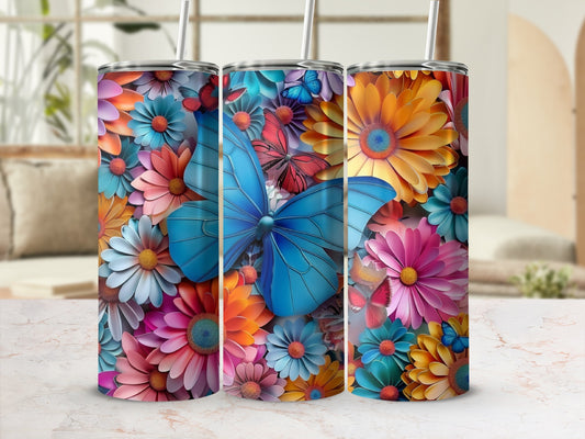 Three tall tumblers adorned with colorful flowers and butterflies.