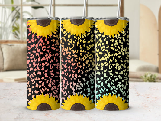 Three tumblers with sunflower and leopard print designs.