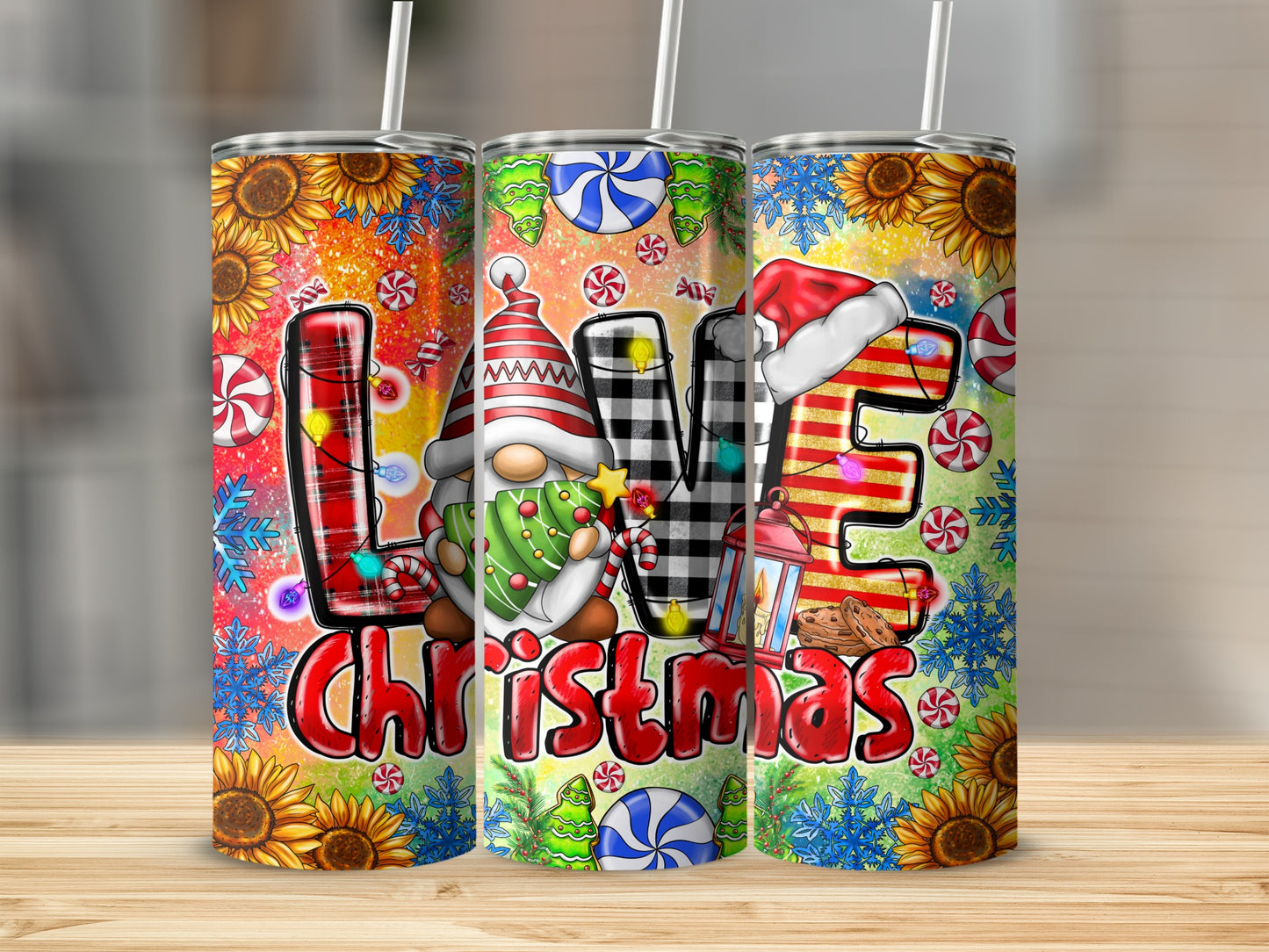 Three Christmas tumblers featuring gnomes, snowflakes, and sunflowers.