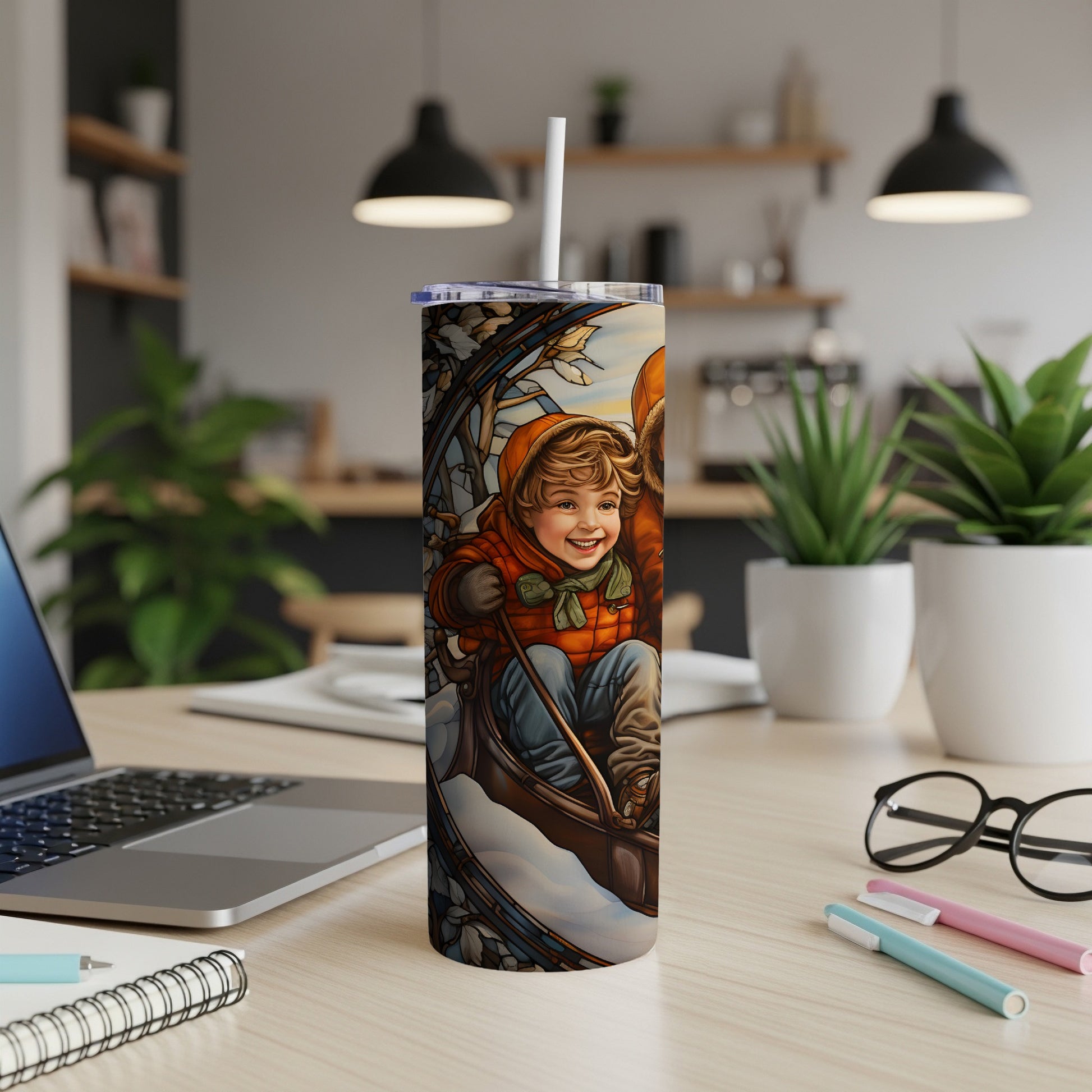 Child in a sled with a winter forest background on a tumbler.