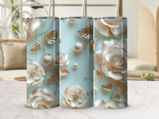 Three tumblers with embossed gold roses and pearls on a pale blue background.