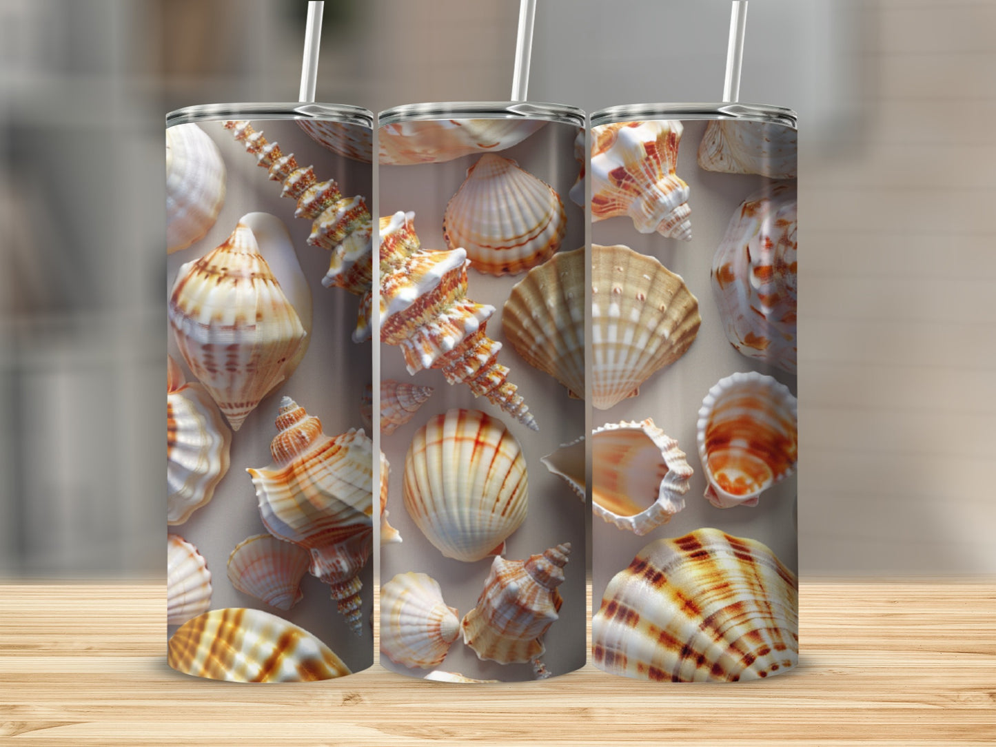 Three tumblers featuring a collage of detailed seashells in warm tones.