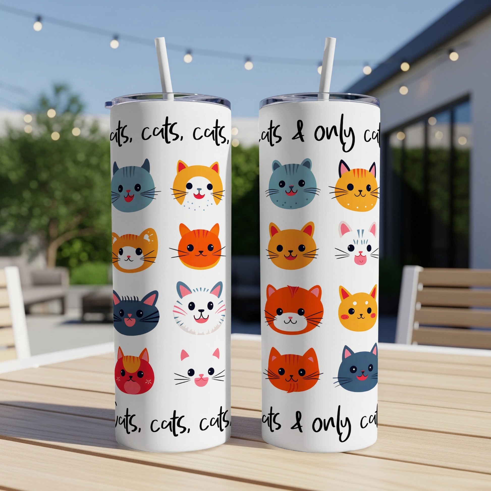 Two tumblers with colorful cartoon cat faces and the text "cats, cats, cats & only cat."