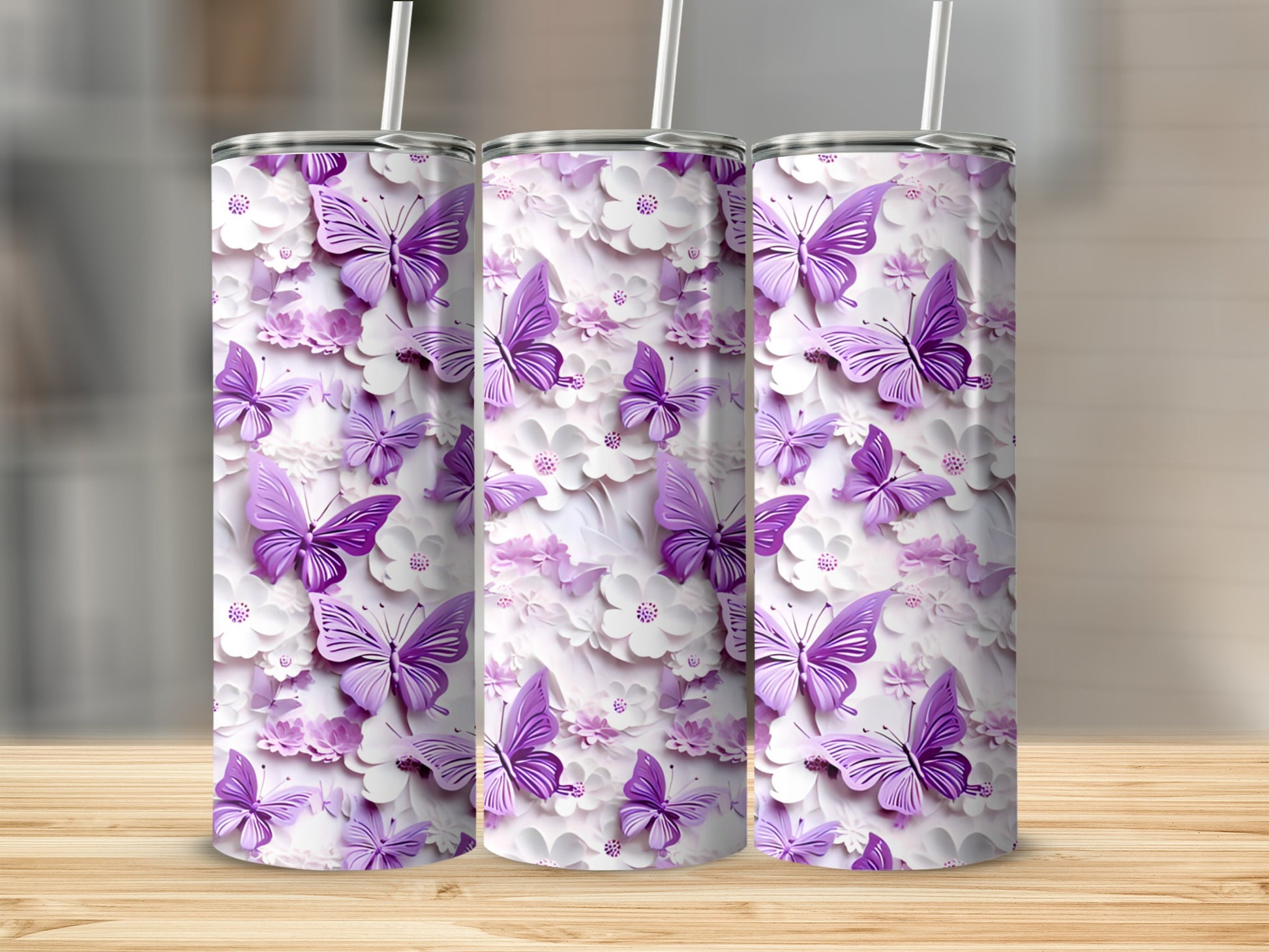Three tumblers with a purple butterfly and floral pattern.