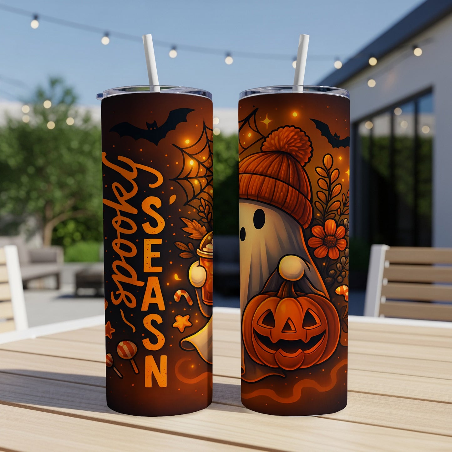Two Halloween tumblers featuring a ghost with a pumpkin and "spooky season" text.